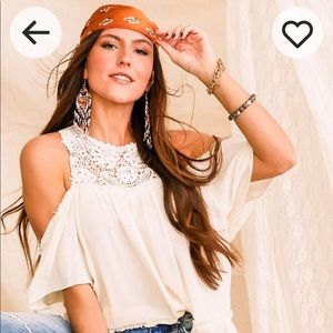 Gimmicks cream off the shoulder top